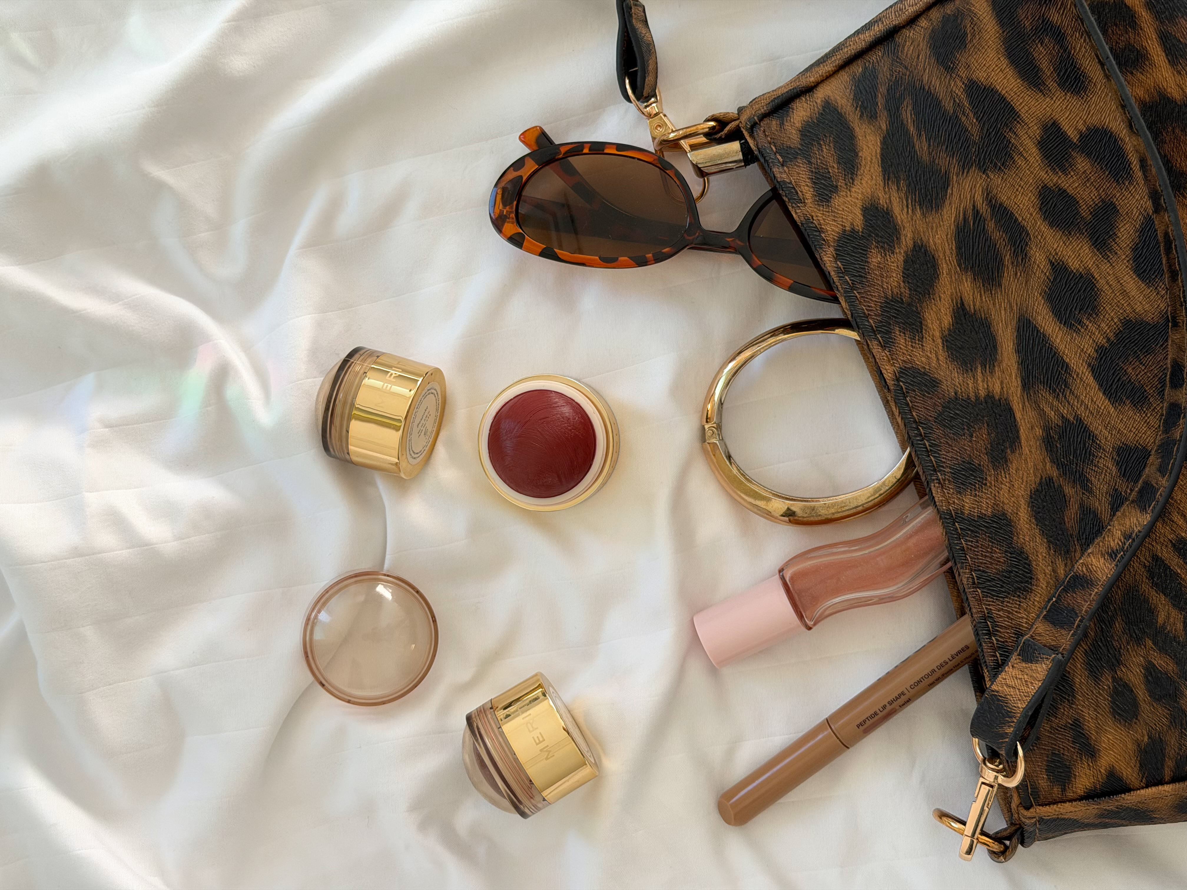 Beauty products and accessories flat lay