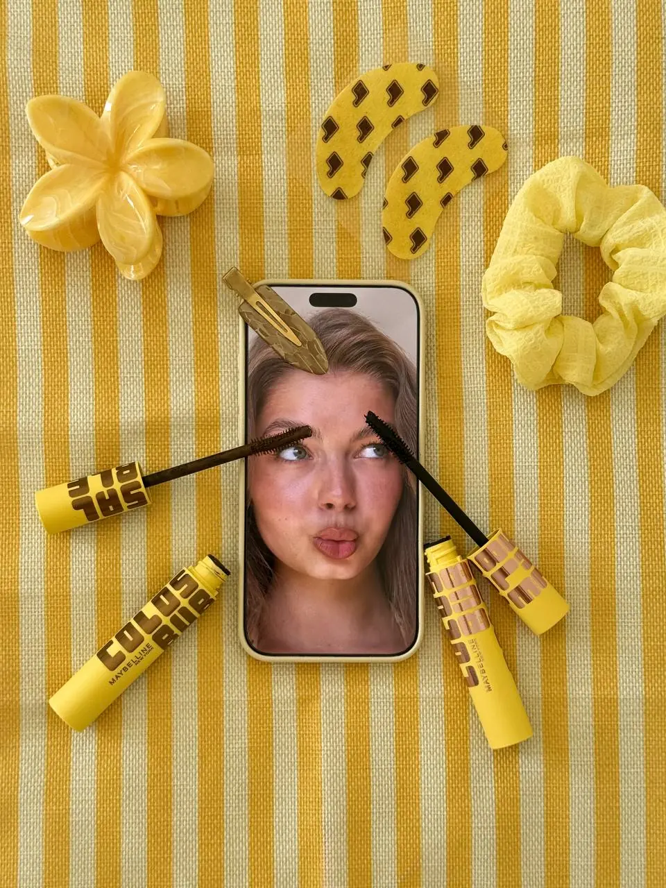 UGC flat lay featuring Maybelline mascara